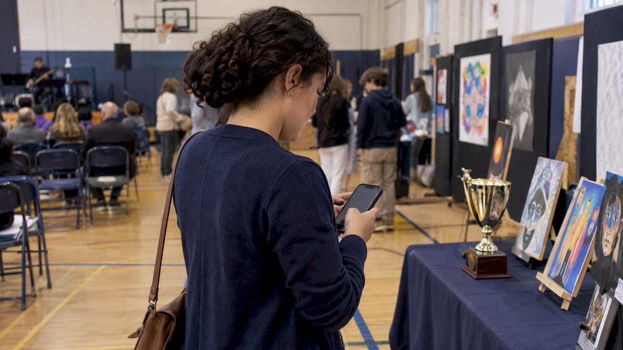 Supporter casting a paid vote at a fundraiser